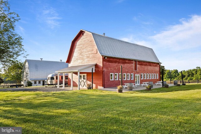 23350 Cedar Mountain Dr, Rapidan, VA 22733 - back of property with a yard, a barn, a patio, and metal roof