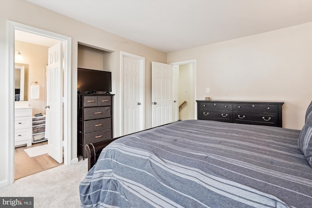 22953 Fleet Ter, Sterling, VA 20166 - carpeted bedroom with connected bathroom
