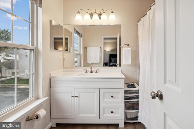 22953 Fleet Ter, Sterling, VA 20166 - bathroom featuring vanity and healthy amount of natural light