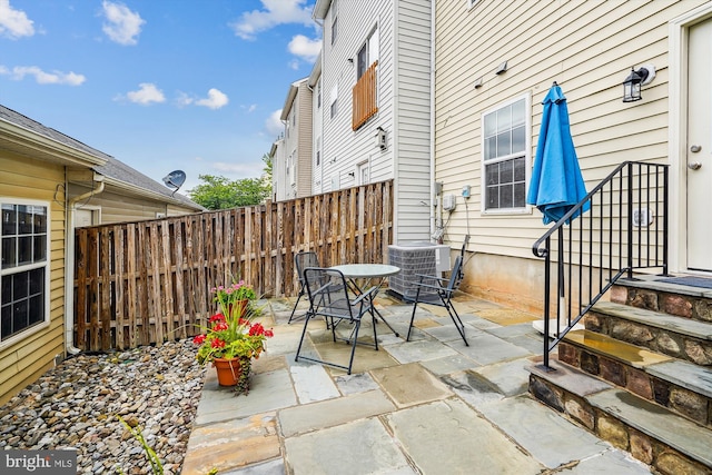 22953 Fleet Ter, Sterling, VA 20166 - view of patio with cooling unit and outdoor dining space