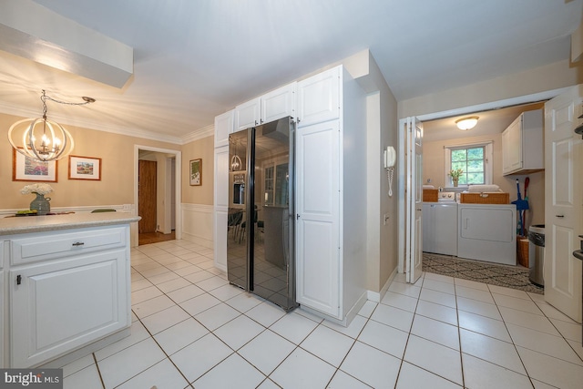 849 Milmar Rd, Newtown Square, PA 19073 - kitchen featuring independent washer and dryer, black fridge with ice dispenser, a chandelier, white cabinetry, and crown molding