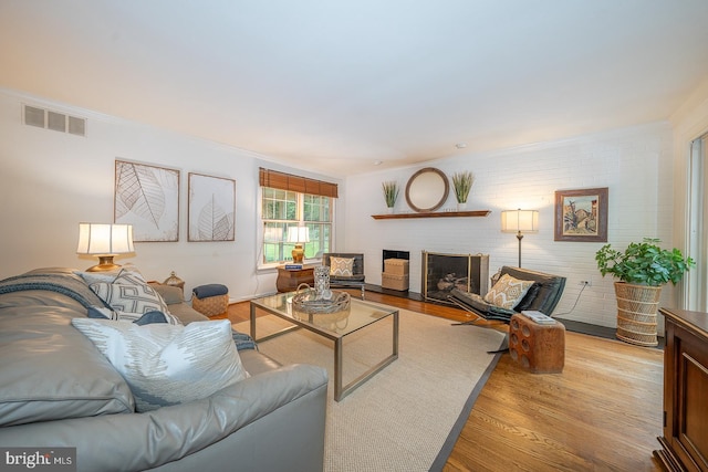 849 Milmar Rd, Newtown Square, PA 19073 - living area featuring wood finished floors and crown molding