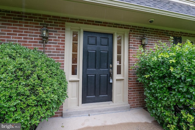 849 Milmar Rd, Newtown Square, PA 19073 - property entrance with brick siding and roof with shingles