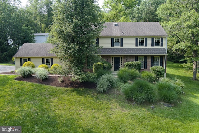 849 Milmar Rd, Newtown Square, PA 19073 - view of front of house with a front yard and a shingled roof