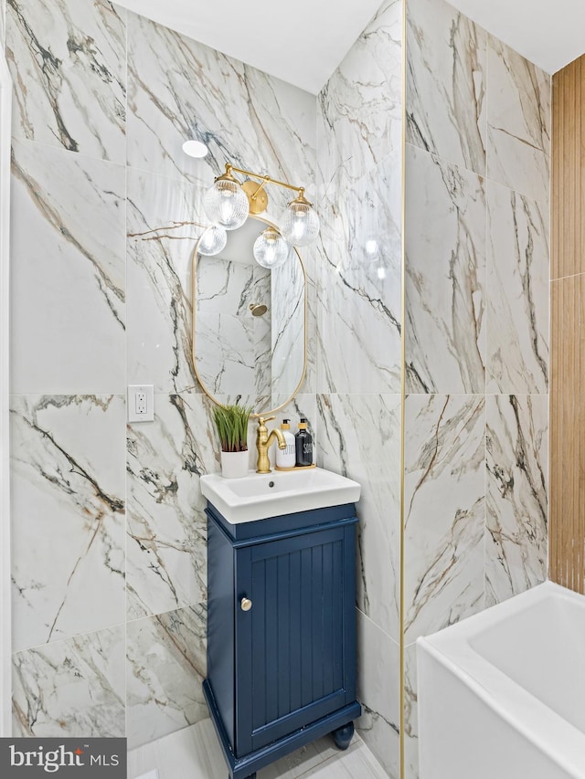 212 W 13th Ave, Wildwood, NJ 08260 - full bath featuring vanity, a tub, tile walls, and marble tiled flooring