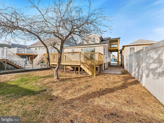 212 W 13th Ave, Wildwood, NJ 08260 - back of property with stairway and a wooden deck