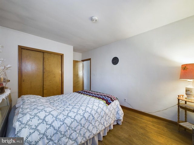 834 Amboy Ave, Edison, NJ 08837 - bedroom with a closet, wood finished floors, and baseboards