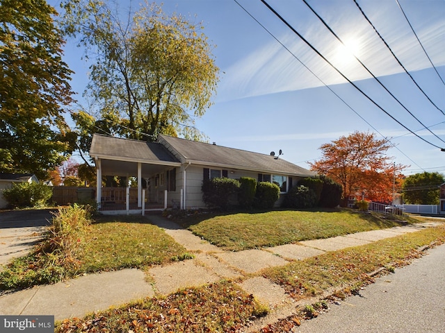 834 Amboy Ave, Edison, NJ 08837 - ranch-style home featuring covered porch and an attached carport