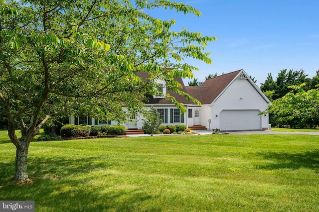 11307 Urieville Ln, Worton, MD 21678 - view of front of property featuring a garage, a front yard, driveway, and a shingled roof