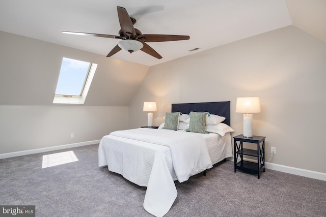 11307 Urieville Ln, Worton, MD 21678 - bedroom with lofted ceiling, a ceiling fan, a skylight, carpet flooring, and baseboards