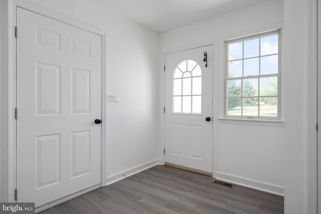 11307 Urieville Ln, Worton, MD 21678 - doorway to outside featuring wood finished floors and baseboards
