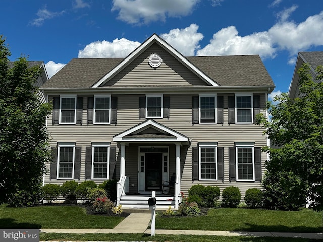 36 Brookdale Way, Chesterfield, NJ 08515 - colonial-style house with a front lawn and a shingled roof