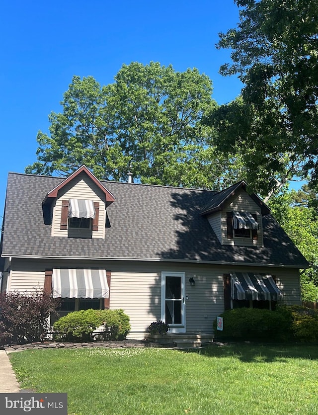 427 Tulip Ave, Absecon, NJ 08205 - cape cod-style house featuring a front lawn