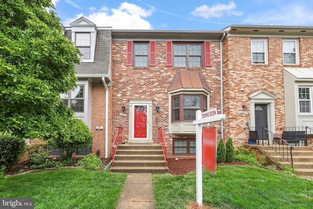 3950 Tallow Tree Pl, Fairfax, VA 22033 - multi unit property with brick siding and a front yard