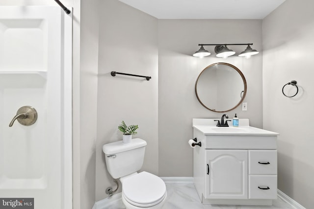 3950 Tallow Tree Pl, Fairfax, VA 22033 - bathroom featuring marble look tiles, vanity, toilet, and baseboards