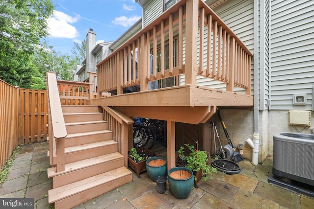 3950 Tallow Tree Pl, Fairfax, VA 22033 - deck with central AC, stairs, and a patio area