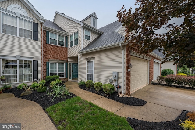 61 Grand Banks Cir, Marlton, NJ 08053 - view of front of house featuring roof with shingles, brick siding, and an attached garage