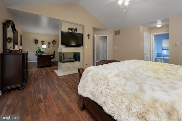 61 Grand Banks Cir, Marlton, NJ 08053 - bedroom featuring dark wood finished floors, a multi sided fireplace, lofted ceiling, and baseboards