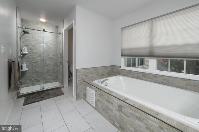 61 Grand Banks Cir, Marlton, NJ 08053 - full bathroom with a bath, a stall shower, and toilet
