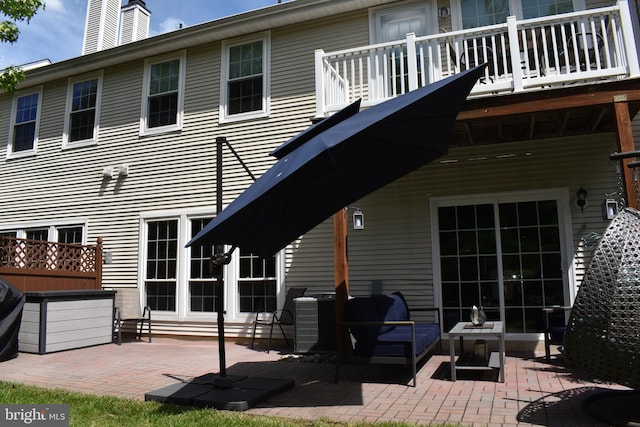 61 Grand Banks Cir, Marlton, NJ 08053 - back of property with a patio area and a chimney