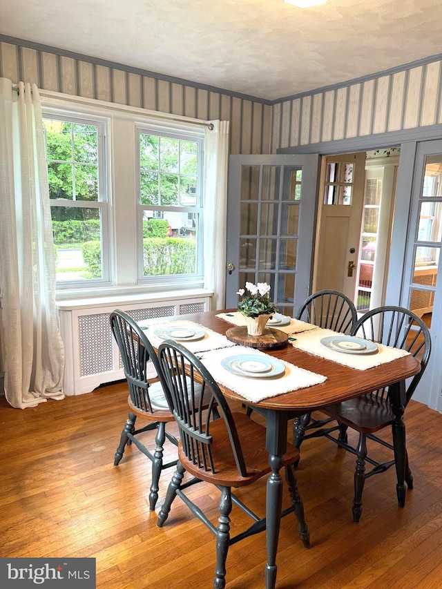 241 Edge Hill Rd, Glenside, PA 19038 - dining space with light wood-style flooring and radiator heating unit