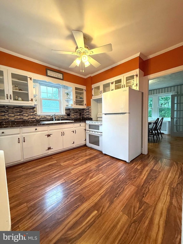 241 Edge Hill Rd, Glenside, PA 19038 - kitchen featuring white appliances, dark countertops, a sink, white cabinets, and dark wood-style floors