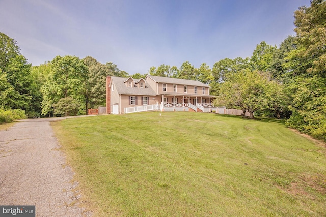2605 Magdalene Acres Pl, Waldorf, MD 20603 - colonial home featuring an attached garage, a chimney, driveway, and covered porch