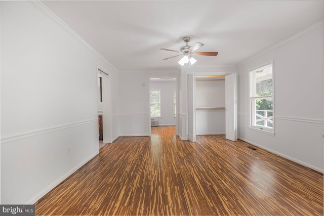 2605 Magdalene Acres Pl, Waldorf, MD 20603 - unfurnished living room with plenty of natural light, crown molding, wood finished floors, ceiling fan, and baseboards