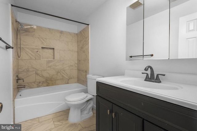 2605 Magdalene Acres Pl, Waldorf, MD 20603 - bathroom with vanity, toilet, shower / bathtub combination, and marble look tiles