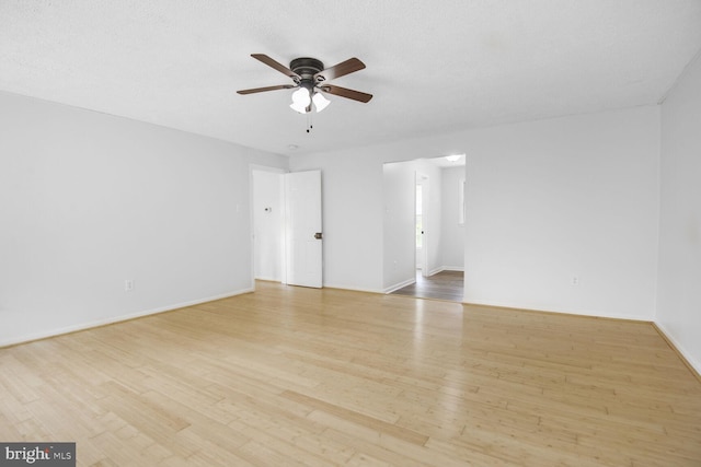 2605 Magdalene Acres Pl, Waldorf, MD 20603 - empty room featuring a ceiling fan, wood finished floors, and baseboards