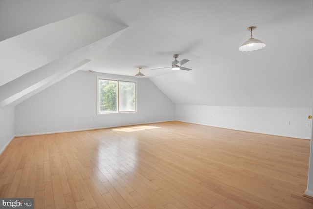 2605 Magdalene Acres Pl, Waldorf, MD 20603 - additional living space with vaulted ceiling, light wood-type flooring, ceiling fan, and baseboards