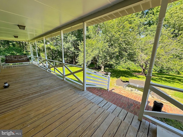 2605 Magdalene Acres Pl, Waldorf, MD 20603 - porch featuring a lawn and view of wooded area