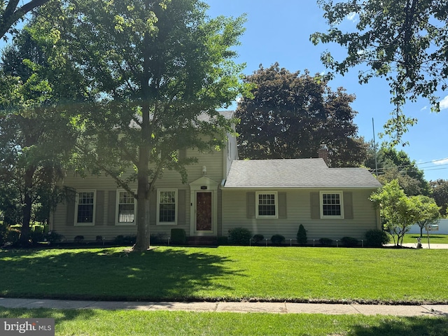 11 Lenape Trl, Wenonah, NJ 08090 - view of front of home with a front yard and a chimney