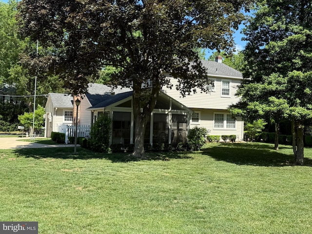 11 Lenape Trl, Wenonah, NJ 08090 - view of front of property with a front yard and a sunroom