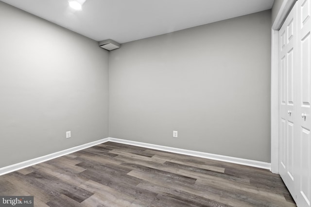 4727 Exeter St, Annandale, VA 22003 - unfurnished bedroom featuring a closet, dark wood finished floors, and baseboards