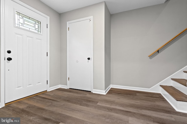 4727 Exeter St, Annandale, VA 22003 - entrance foyer featuring wood finished floors, stairway, and baseboards