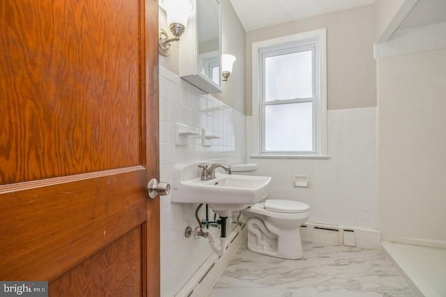 531 Jessamine Ave, Collingswood, NJ 08107 - full bathroom featuring tile walls, a baseboard heating unit, marble look tiles, toilet, and wainscoting