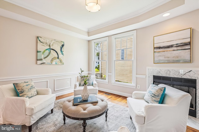 2227 N Albemarle St, Arlington, VA 22207 - living area featuring crown molding, wood finished floors, a high end fireplace, and recessed lighting