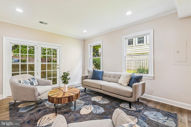 2227 N Albemarle St, Arlington, VA 22207 - living area with wood finished floors, baseboards, ornamental molding, electric panel, and recessed lighting