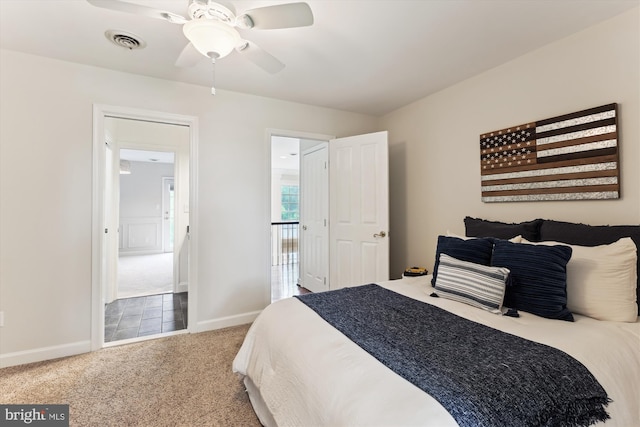 2740 Hunter Mill Rd, Oakton, VA 22124 - carpeted bedroom featuring baseboards and a ceiling fan