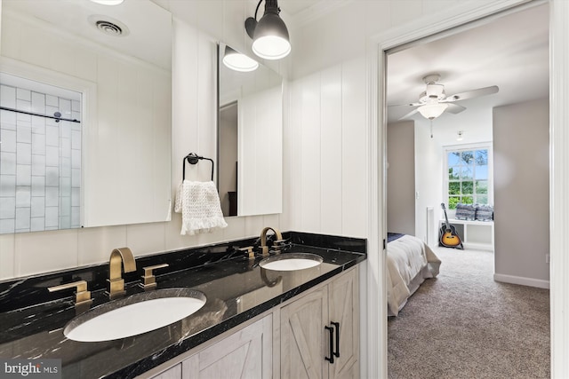 2740 Hunter Mill Rd, Oakton, VA 22124 - ensuite bathroom with double vanity, ceiling fan, and baseboards