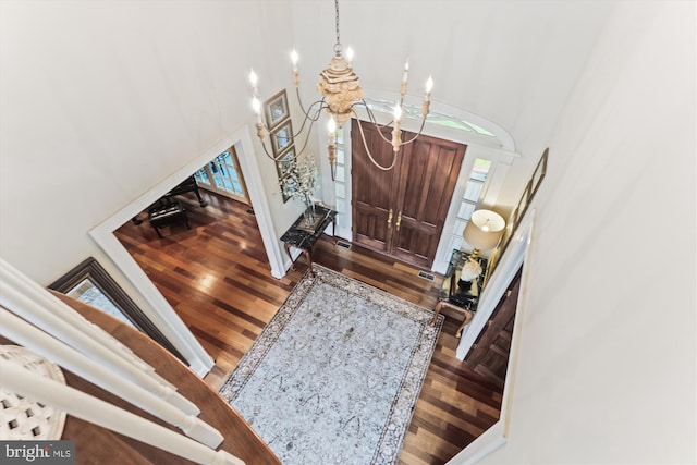 2740 Hunter Mill Rd, Oakton, VA 22124 - entryway with a high ceiling, wood finished floors, plenty of natural light, and a chandelier