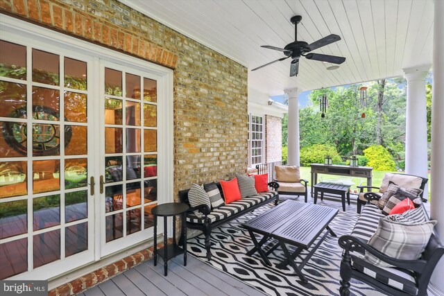 2740 Hunter Mill Rd, Oakton, VA 22124 - deck with an outdoor living space, ceiling fan, and french doors