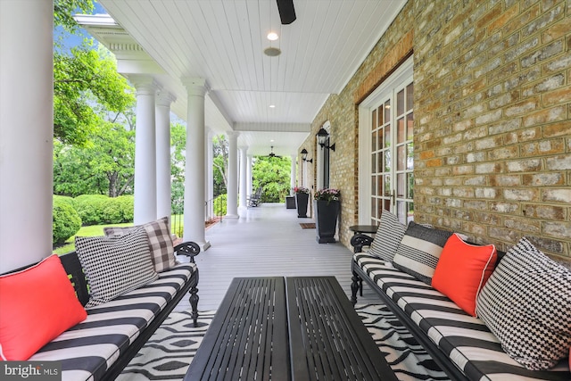 2740 Hunter Mill Rd, Oakton, VA 22124 - covered porch featuring an outdoor living space and a ceiling fan
