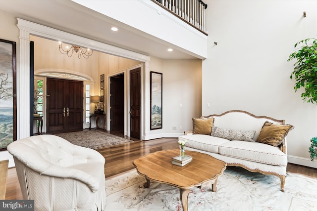 2740 Hunter Mill Rd, Oakton, VA 22124 - living room featuring wood finished floors, baseboards, a chandelier, and recessed lighting