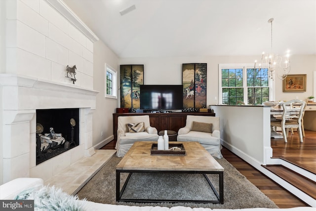2740 Hunter Mill Rd, Oakton, VA 22124 - living area featuring wood finished floors, a chandelier, plenty of natural light, and baseboards