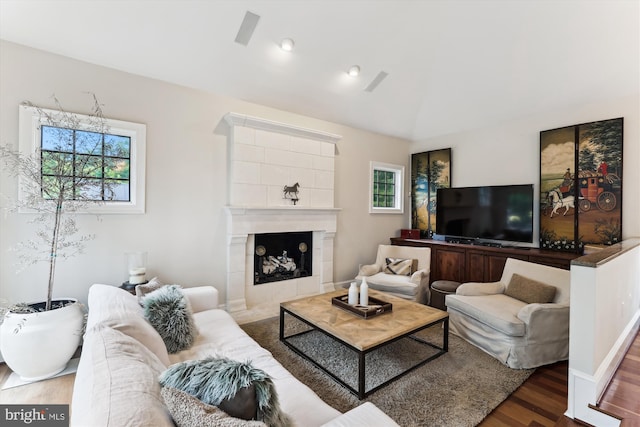 2740 Hunter Mill Rd, Oakton, VA 22124 - living room featuring plenty of natural light, wood finished floors, and a tiled fireplace
