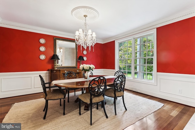 2740 Hunter Mill Rd, Oakton, VA 22124 - dining room featuring a wainscoted wall, a chandelier, ornamental molding, and wood finished floors