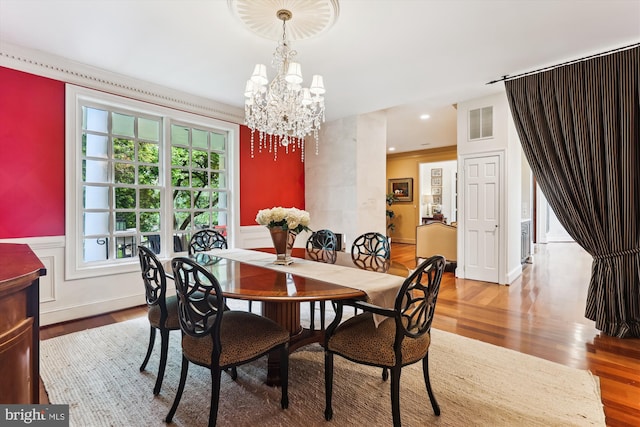 2740 Hunter Mill Rd, Oakton, VA 22124 - dining space with wood finished floors, a chandelier, wainscoting, and recessed lighting
