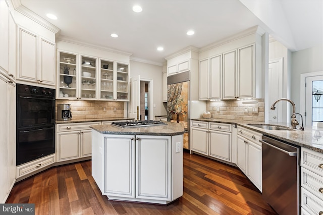 2740 Hunter Mill Rd, Oakton, VA 22124 - kitchen featuring stainless steel appliances, a sink, tasteful backsplash, dark wood-type flooring, and recessed lighting